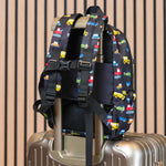 kids backpack strapped on to a suitcase