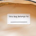 name tag in kids traveling backpack
